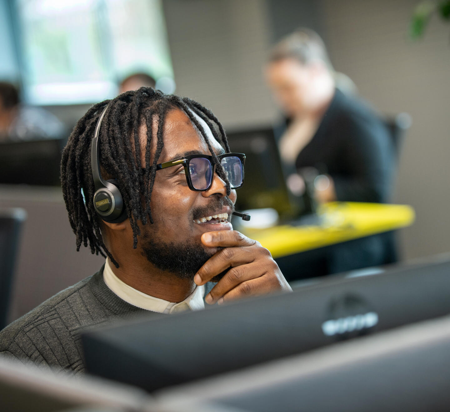 Lemon Contact Centre operator wearing headset for call handling