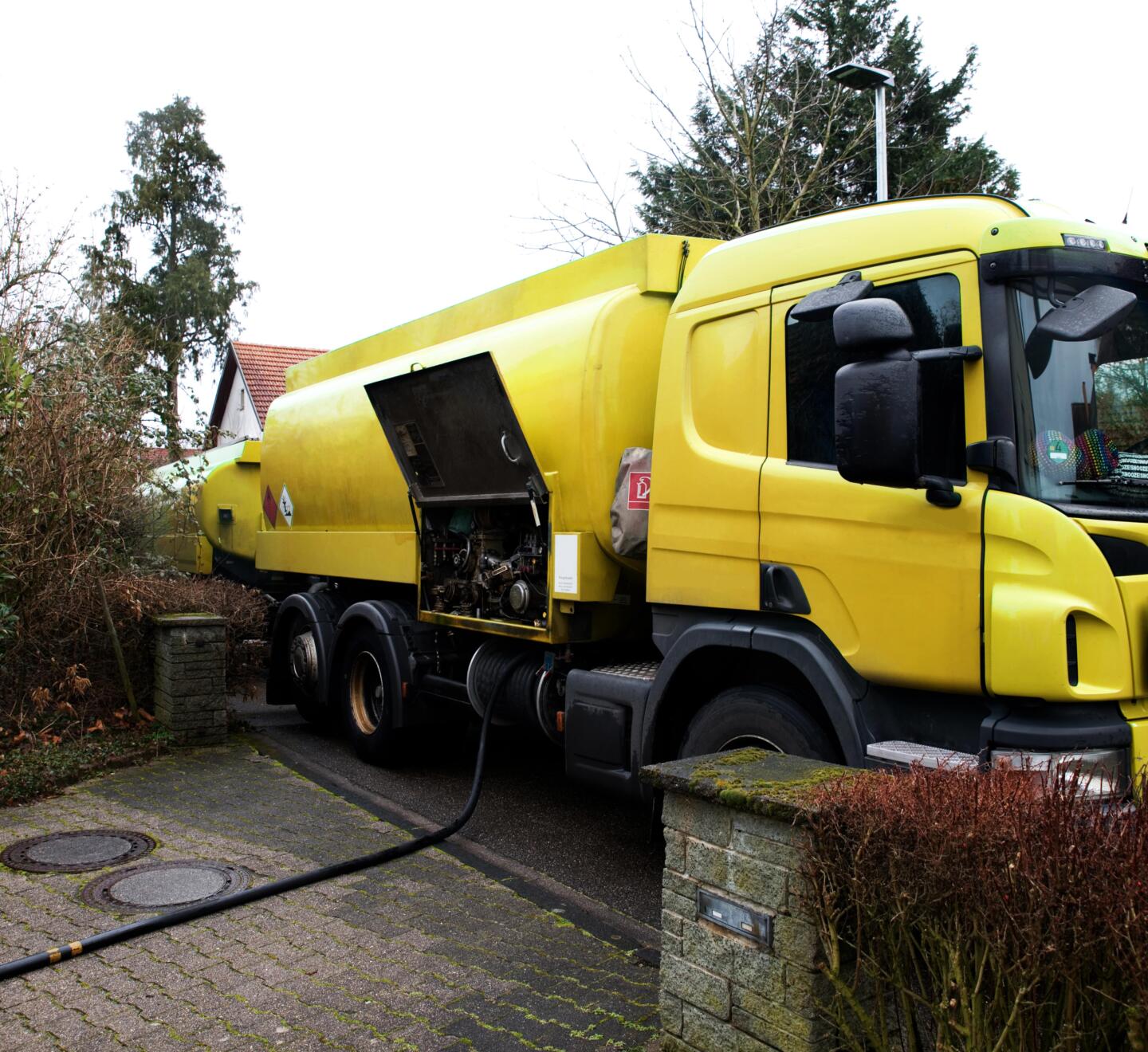 Yellow truck delivering home heating oil