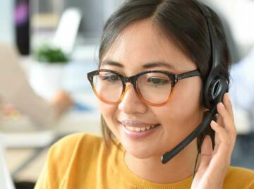 Contact centre operator wearing headset
