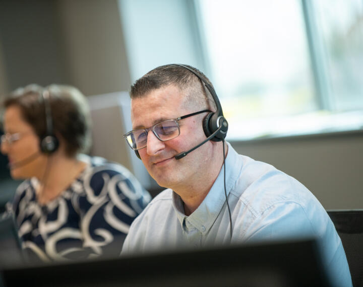 Lemon Contact Centre operator wearing headset for call handling